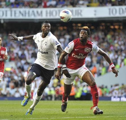 Tottenham Hotspur vs. Arsenal FC London - Premier League - Emmanuel Adebayor and Alex Song compete for the ball 