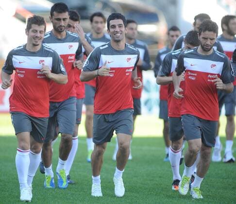 Turkey National football team players continued to do on training in Istanbul on October 04, 2011. Pictured: L to R, Emre Belozoglu, Arda Turan, Gokhan Gonul and Co trainer Engin Ipekoglu. 