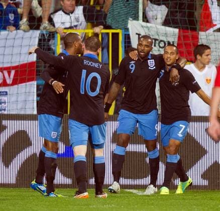 Darren Bent celebrates scoring with Theo Walcott European Championship Qualifying Group G Montenegro v England 7th October, 2011 EDITORIAL USE ONLY. No use with unauthorised audio, video, data, fixture lists, club league logos or live services. Online in-match use limited to 120 images, no video emulation. No use in betting, games or single club league player publications. Euro Podgorica
