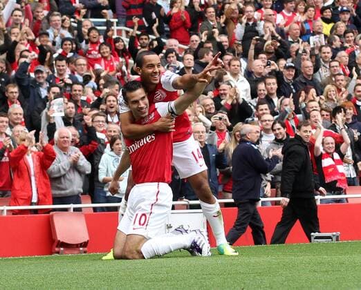 Arsenals Robin Van Persie celebrates scoring his sides opening goal with Theo Walcott Barclays Premier League Arsenal v Sunderland 16th October, 2011 EDITORIAL USE ONLY. No use with unauthorised audio, video, data, fixture lists, club league logos or live services. Online in-match use limited to 120 images, no video emulation. No use in betting, games or single club league player publications.