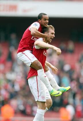 Arsenals Theo Walcott celebrates at the final whitstle with Per Mertesacker Barclays Premier League Arsenal v Sunderland 16th October, 2011 EDITORIAL USE ONLY. No use with unauthorised audio, video, data, fixture lists, club league logos or live services. Online in-match use limited to 120 images, no video emulation. No use in betting, games or single club league player publications.