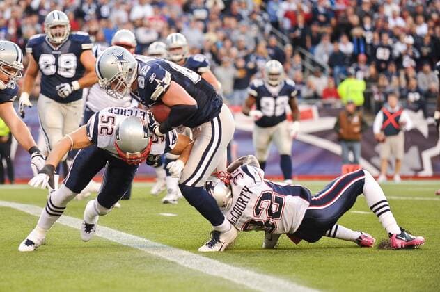Oct. 16, 2011 - Foxborough, Massachusetts, U.S - Dallas Cowboys TE Jason Witten (82) breaks the plane for a touchdown while New England Patriots CB Devin McCourty (32) and LB Dane Fletcher (52) work on stopping him. The New England Patriots leads the Dallas Cowboys 13 - 10 at half time at Gillette Stadium. NFL American Football Herren USA 2011 - Cowboys at Patriots - ZUMAq39