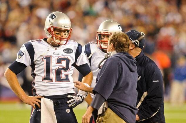 Oct. 16, 2011 - Foxborough, Massachusetts, U.S - New England Patriots QB Tom Brady (12) talks with head coach Bill Belichick strategizing the final play of the drive, finishing in the game winning touchdown. The New England Patriots defeat the Dallas Cowboys 20 - 16 at Gillette Stadium. NFL American Football Herren USA 2011 - Cowboys at Patriots - ZUMAq39