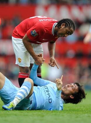 Anderson of Manchester United and David Silva of Manchester City accuses each other following a tackle on each other Barclays Premier League Manchester United v Manchester City 23rd October, 2011 EDITORIAL USE ONLY. No use with unauthorised audio, video, data, fixture lists, club league logos or live services. Online in-match use limited to 120 images, no video emulation. No use in betting, games or single club league player publications. o0 ManU