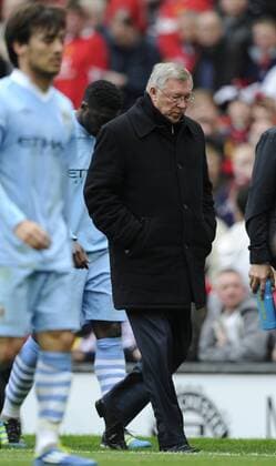 Sir Alex Ferguson manager of Manchester United walks off at half time Barclays Premier League Manchester United v Manchester City 23rd October, 2011 EDITORIAL USE ONLY. No use with unauthorised audio, video, data, fixture lists, club league logos or live services. Online in-match use limited to 120 images, no video emulation. No use in betting, games or single club league player publications. o0 ManU