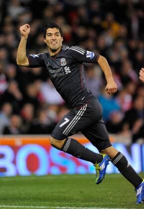 Luis Suarez of Liverpool celebrates scoring the equalising goal Carling Cup Stoke City v Liverpool 26th October, 2011 EDITORIAL USE ONLY. No use with unauthorised audio, video, data, fixture lists, club league logos or live services. Online in-match use limited to 120 images, no video emulation. No use in betting, games or single club league player publications.