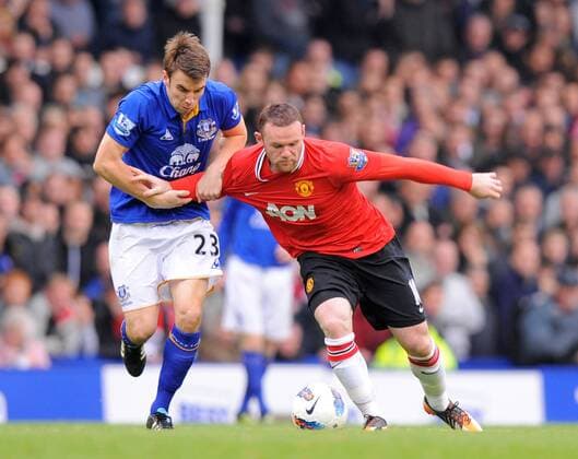 Seamus Coleman of Everton challenges Wayne Rooney of Manchester United Barclays Premier League FC Everton vs Manchester United (ManU) 29th October, 2011 EDITORIAL USE ONLY. No use with unauthorised audio, video, data, fixture lists, club league logos or live services. Online in-match use limited to 120 images, no video emulation. No use in betting, games or single club league player publications.