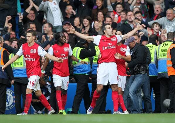 Arsenals Robin van Persie celebrates scoring his second goal Barclays Premier League FC Chelsea London vs FC Arsenal London 29th October, 2011 EDITORIAL USE ONLY. No use with unauthorised audio, video, data, fixture lists, club league logos or live services. Online in-match use limited to 120 images, no video emulation. No use in betting, games or single club league player publications.