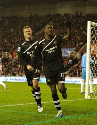 Demba Ba of Newcastle United celebrates scoring from the penalty spot, Stoke City - Newcastle United, Stoke on Trent EDITORIAL USE ONLY. No use with unauthorised audio, video, data, fixture lists, club league logos or live services. Online in-match use limited to 120 images, no video emulation. No use in betting, games or single club league player publications.
