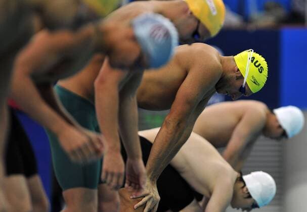 Ian Thorpe (C) of Australia prepares for the men s 100m Butterfly heats at the FINA 2011 Swimming World Cup (Beijing), in Beijing, capital of China, on Nov. 9, 2011. (Xinhua Kong Hui) CHINA-BEIJING-SWIMMING-FINA SHORT COURSE WORLD CUP (CN) 