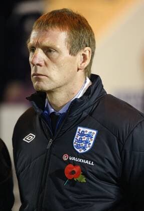 England Under-21 manager Stuart Pearce is seen wearing a poppy during the Under-21 Euro 2013 qualifying match between England and Iceland at Weston Homes Community Stadium, Colchester, England, on November 10, 2011 U21 International England U21 v Iceland U21 10th November, 2011 EDITORIAL USE ONLY. No use with unauthorised audio, video, data, fixture lists, club league logos or live services. Online in-match use limited to 120 images, no video emulation. No use in betting, games or single club league player publications. o0 Poppy Mohnblume Volkstrauertag Gedenken Feiertag Remembrance Day Porträt