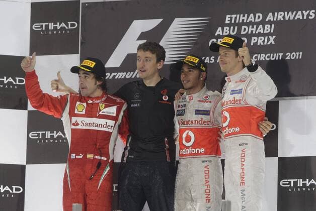 Podium: Fernando Alonso (Scuderia Ferrari), Lewis Hamilton (McLaren Mercedes), Jenson Button (McLaren Mercedes) GP Abu Dhabi 2011 Formel 1 Grand Prix Abu Dhabi 2011