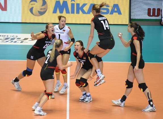 Players of Germany with Angelina Grün celebrate after scoring during the match against Japan at the FIVB Women s World Cup 2011 in Tokyo, Japan, on Nov. 17, 2011. Japan won 3-2 - 