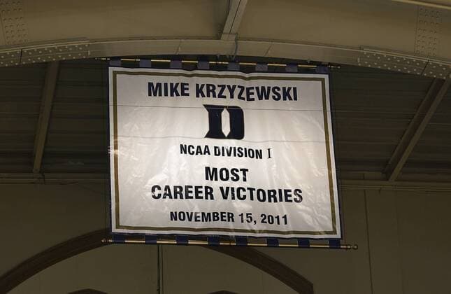 Nov. 18, 2011 - Durham, NC, USA - A new banner celebrating Duke head coach Mike Krzyzewski s NCAA College League USA Division I record of 903 wins is unveiled after the game against Davidson at Cameron Indoor Stadium in Durham, North Carolina, Friday, November 18, 2011. Duke defeated Davidson, 82-69. Davidson v Duke - ZUMAm67