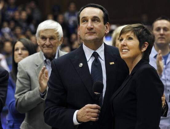 Nov. 18, 2011 - Durham, NC, USA - Duke head coach Mike Krzyzewski and his wife, Mickie, watch as a new banner celebrating his NCAA College League USA Division I record is unveiled after the Davidson game at at Cameron Indoor Stadium in Durham, North Carolina, Friday, November 18, 2011. At left is former Duke Athletic Director Tom Butters, who hired Krzyzewski. Duke defeated Davidson, 82-69. Davidson v Duke - ZUMAm67 privat Familie Frau
