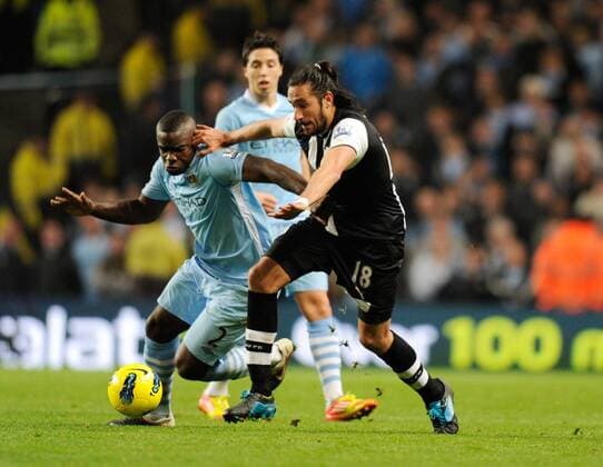 Jonas Gutierrez of Newcastle United and Micah Richards of Manchester City - Premier League Manchester City v Newcastle United 19th November, 2011 EDITORIAL USE ONLY. No use with unauthorised audio, video, data, fixture lists, club league logos or live services. Online in-match use limited to 120 images, no video emulation. No use in betting, games or single club league player publications.