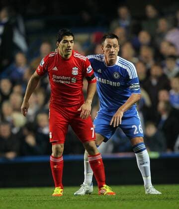 Chelseas John Terry tussles with Liverpools Luis Suarez Barclays Premier League Chelsea v Liverpool 20th November, 2011 EDITORIAL USE ONLY. No use with unauthorised audio, video, data, fixture lists, club league logos or live services. Online in-match use limited to 120 images, no video emulation. No use in betting, games or single club league player publications.