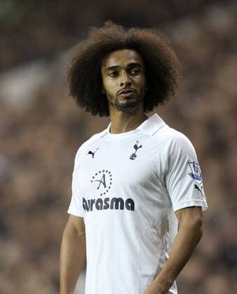 Tottenhams Benoit Assou-Ekotto shows off his new hair style Barclays Premier League Tottenham Hotspur v Aston Villa 21st November, 2011 EDITORIAL USE ONLY. No use with unauthorised audio, video, data, fixture lists, club league logos or live services. Online in-match use limited to 120 images, no video emulation. No use in betting, games or single club league player publications.