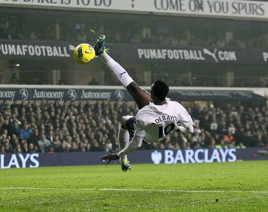 Tottenhams Emmanuel Adebayor scoring his sides opening goal Barclays Premier League Tottenham Hotspur v Aston Villa 21st November, 2011 EDITORIAL USE ONLY. No use with unauthorised audio, video, data, fixture lists, club league logos or live services. Online in-match use limited to 120 images, no video emulation. No use in betting, games or single club league player publications.