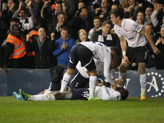 Tottenhams Emmanuel Adebayor celebrates scoring his sides opening goal Barclays Premier League Tottenham Hotspur v Aston Villa 21st November, 2011 EDITORIAL USE ONLY. No use with unauthorised audio, video, data, fixture lists, club league logos or live services. Online in-match use limited to 120 images, no video emulation. No use in betting, games or single club league player publications.