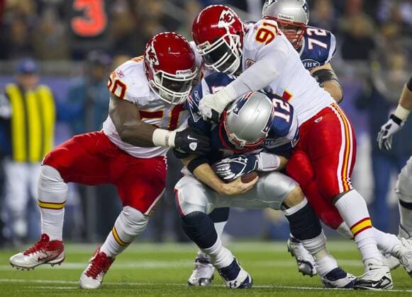 Nov. 21, 2011 - Foxboro, MA, USA - Kansas City Chiefs outside linebacker Justin Houston (50) and Kansas City Chiefs outside linebacker Tamba Hali (91) sacked New England Patriots quarterback Tom Brady (12) in the second quarter on Monday, November 21, 2011 at Gillette Stadium in Foxboro, Massachusetts. Chiefs at Patriots - ZUMAm67