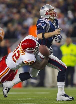 Nov. 21, 2011 - Foxboro, MA, USA - Kansas City Chiefs defensive end Wallace Gilberry (92) strips the football from New England Patriots quarterback Tom Brady (12) in the second quarter on November 21, 2011 at Gillette Stadium in Foxboro, Massachusetts. Chiefs at Patriots - ZUMAm67