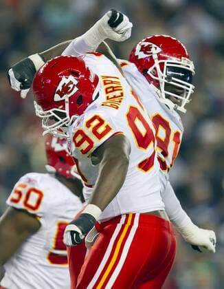 Nov. 21, 2011 - Foxboro, MA, USA - Kansas City Chiefs outside linebacker Tamba Hali (91), right, celebrated his sack of New England Patriots quarterback Tom Brady (12) with teammate Wallace Gilberry (92) in the second quarter on Monday, November 21, 2011 at Gillette Stadium in Foxboro, Massachusetts. Chiefs at Patriots - ZUMAm67