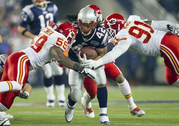 Nov. 21, 2011 - Foxboro, MA, USA - New England Patriots running back BenJarvus Green-Ellis (42) was tackled by Kansas City Chiefs inside linebacker Jovan Belcher (59) and Kansas City Chiefs outside linebacker Tamba Hali (91) in the second quarter on Monday, November 21, 2011 at Gillette Stadium in Foxboro, Massachusetts. Chiefs at Patriots - ZUMAm67