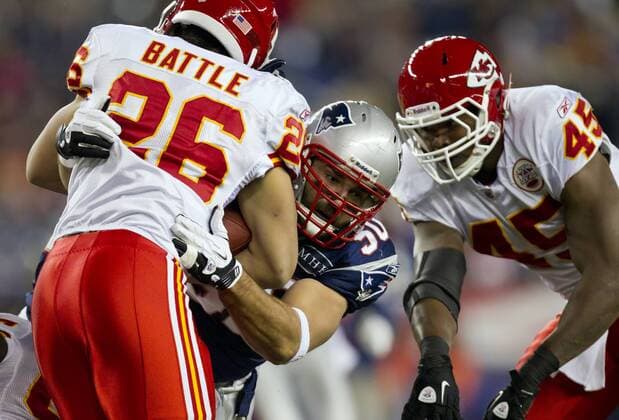 Nov. 21, 2011 - Foxboro, MA, USA - New England Patriots outside linebacker Rob Ninkovich (50) tackled Kansas City Chiefs running back Jackie Battle (26) in the first quarter on Monday, November 21, 2011 at Gillette Stadium in Foxboro, Massachusetts. Chiefs at Patriots - ZUMAm67