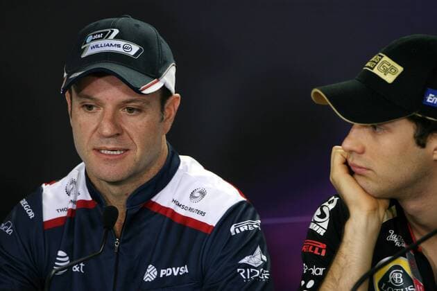 24.11.2011- Rubens Barrichello (BRA), Williams FW33 and Bruno Senna (BRA), Lotus Renault GP R31 Brazilian Grand Prix, Sao Paulo 24-27 November 2011 