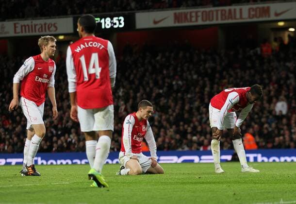 Arsenals Thomas Vermaelen looks on dejected after scoring an own goal to put Fulham 1-0 up Barclays Premier League Arsenal v Fulham 26th November, 2011 EDITORIAL USE ONLY. No use with unauthorised audio, video, data, fixture lists, club league logos or live services. Online in-match use limited to 120 images, no video emulation. No use in betting, games or single club league player publications.