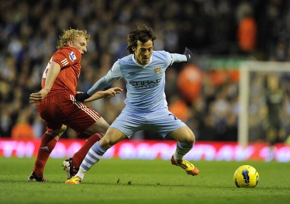 David Silva of Manchester City twists past Dirk Kuyt of Liverpool Barclays Premier League Liverpool v Manchester City 27th November, 2011 EDITORIAL USE ONLY. No use with unauthorised audio, video, data, fixture lists, club league logos or live services. Online in-match use limited to 120 images, no video emulation. No use in betting, games or single club league player publications.