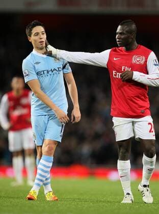 Arsenals Emmanuel Frimpong gets to grips with Manchester Citys Samir Nasri Carling Cup quarter final Arsenal v Manchester City 29th November, 2011 EDITORIAL USE ONLY. No use with unauthorised audio, video, data, fixture lists, club league logos or live services. Online in-match use limited to 120 images, no video emulation. No use in betting, games or single club league player publications.