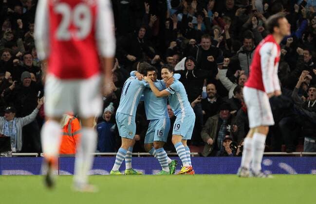 Manchester Citys Sergio Kun Aguero celebrates scoring his sides opening goal with Samir Nasri Carling Cup quarter final Arsenal v Manchester City 29th November, 2011 EDITORIAL USE ONLY. No use with unauthorised audio, video, data, fixture lists, club league logos or live services. Online in-match use limited to 120 images, no video emulation. No use in betting, games or single club league player publications.