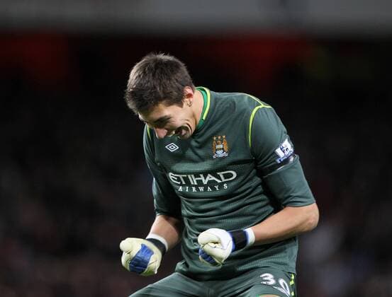 Manchester Citys Costel Pantilimon celebrates his sides opening goal Carling Cup quarter final Arsenal v Manchester City 29th November, 2011 EDITORIAL USE ONLY. No use with unauthorised audio, video, data, fixture lists, club league logos or live services. Online in-match use limited to 120 images, no video emulation. No use in betting, games or single club league player publications.