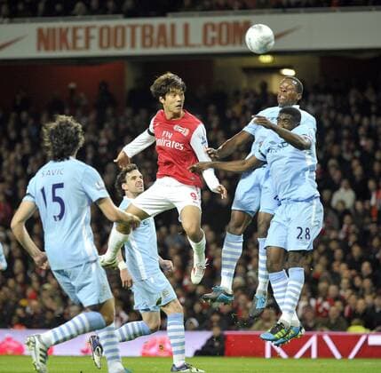 Football - League Cup Quarter Final Arsenal v Manchester City Ju Young Park heads the ball 