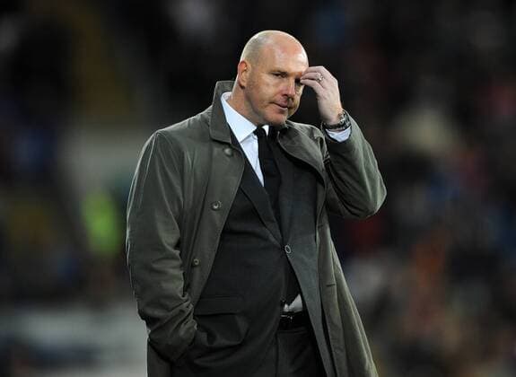 Football - League Cup Quarter Final - Cardiff City vs. Blackburn Rovers Manager of Blackburn Rovers Steve Kean looks dejected as his team go 2-0 down at the Cardiff City Stadium 