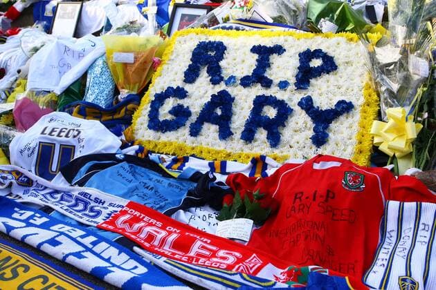 Football - Championship - Leeds United vs. Millwall The Billy Bremner statue at Elland Road is covered with flowers, shirts and dedications to the late Wales manager Gary Speed 