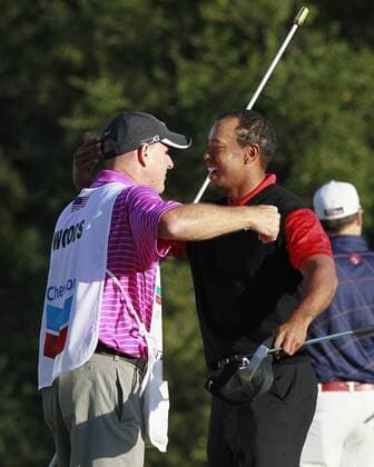 04 December 2011: Tiger Woods celebrates with his caddie Joe LaCava during final round of the Chevron World Challenge at the Sherwood Country Club in Thousand Oaks, CA. PGA Golf Herren DEC 04 Chevron World Challenge - Final Round Icon269111204029 EDITORIAL USE ONLY