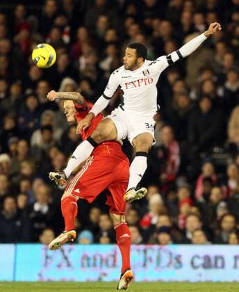 Fulhams Mousa Dembele tussles with Liverpools Martin Skrtel Barclays Premier League Fulham v Liverpool 5th December, 2011 EDITORIAL USE ONLY. No use with unauthorised audio, video, data, fixture lists, club league logos or live services. Online in-match use limited to 120 images, no video emulation. No use in betting, games or single club league player publications.