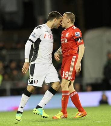 Fulhams Clint Dempsey clashes heads with Liverpools Craig Bellamy Barclays Premier League Fulham v Liverpool 5th December, 2011 EDITORIAL USE ONLY. No use with unauthorised audio, video, data, fixture lists, club league logos or live services. Online in-match use limited to 120 images, no video emulation. No use in betting, games or single club league player publications.