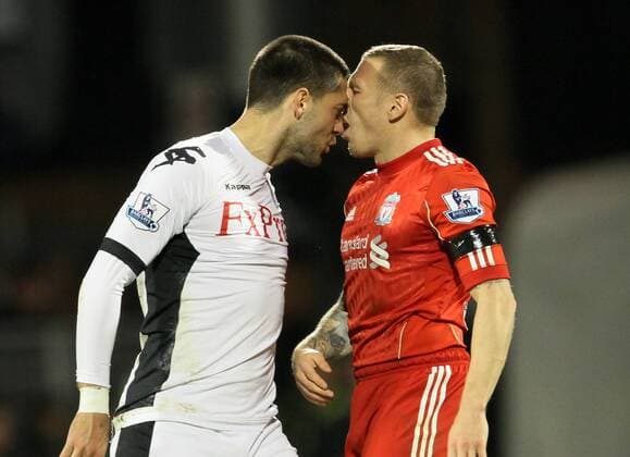 Fulhams Clint Dempsey clashes heads with Liverpools Craig Bellamy Barclays Premier League Fulham v Liverpool 5th December, 2011 EDITORIAL USE ONLY. No use with unauthorised audio, video, data, fixture lists, club league logos or live services. Online in-match use limited to 120 images, no video emulation. No use in betting, games or single club league player publications.