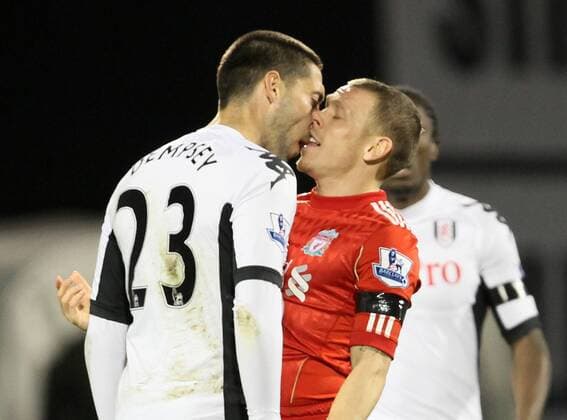 Fulhams Clint Dempsey clashes heads with Liverpools Craig Bellamy Barclays Premier League Fulham v Liverpool 5th December, 2011 EDITORIAL USE ONLY. No use with unauthorised audio, video, data, fixture lists, club league logos or live services. Online in-match use limited to 120 images, no video emulation. No use in betting, games or single club league player publications.
