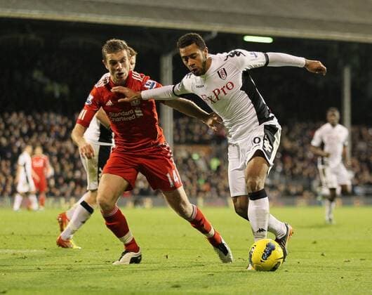 Fulhams Mousa Dembele tussles with Liverpools Jordan Henderson Barclays Premier League Fulham v Liverpool 5th December, 2011 EDITORIAL USE ONLY. No use with unauthorised audio, video, data, fixture lists, club league logos or live services. Online in-match use limited to 120 images, no video emulation. No use in betting, games or single club league player publications.