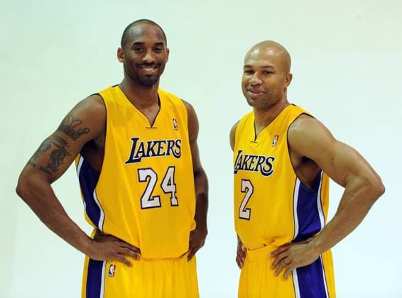 Los Angeles Lakers Kobe Bryant (L) and Derek Fisher participate during the basketball team s media day, at the Lakers training facility in El Segundo, California on December 11, 2011.  LAP2011121131