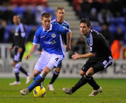 James McCarthy of Wigan Athletic and Frank Lampard of Chelsea Barclays Premier League Wigan Athletic v Chelsea 17th December, 2011 EDITORIAL USE ONLY. No use with unauthorised audio, video, data, fixture lists, club league logos or live services. Online in-match use limited to 120 images, no video emulation. No use in betting, games or single club league player publications.