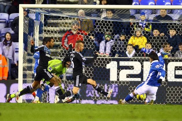 Football - Premier League - Wigan Athletic vs. Chelsea Wigan s Jordi Gomez scores the equalising goal at the DW Stadium 