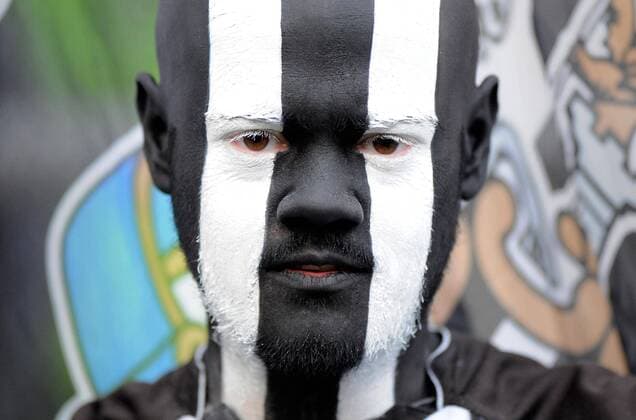 A Newcastle United Fan shows his support with black and white stripes painted on his face during the Premier League football match on 17 December 2011, at Sports Direct Arena, Newcastle upon Tyne, England. EDITORIAL USE ONLY. No use with unauthorised audio, video, data, fixture lists, club league logos or live services. Online in-match use limited to 120 images, no video emulation. No use in betting, games or single club league player publications.