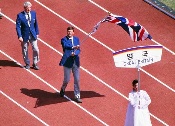 Seoul Olympics 1988 Opening Ceremony - 17 09 1988 Ian Taylor (GBR Hockey player) carries the British Flag and Dick Palmer (President of the British Olympic Association) - behind, who carried the British flag, himself at the Moscow Olympics 