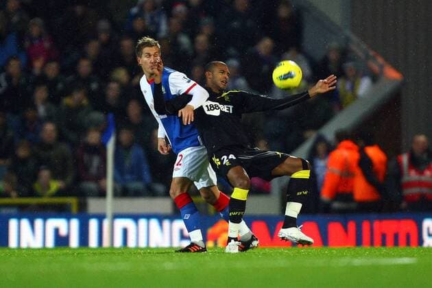 Football - Premier League - Blackburn Rovers vs. Bolton Wanderers Morten Gamst Pedersen of Blackburn Rovers receives a hand in the face from David N Gog of Bolton at Ewood Park 